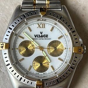 Visage men battery water resistant 3atm silver and gold date&day w/24h